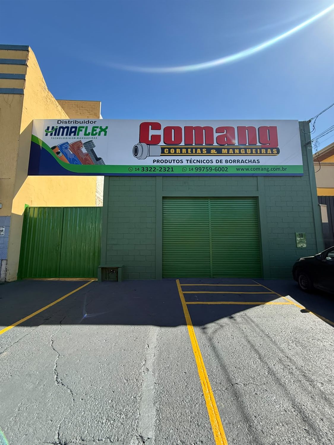Fachada atual da Comang em Ourinhos/SP, com o painel de distribuidor autorizado Himaflex